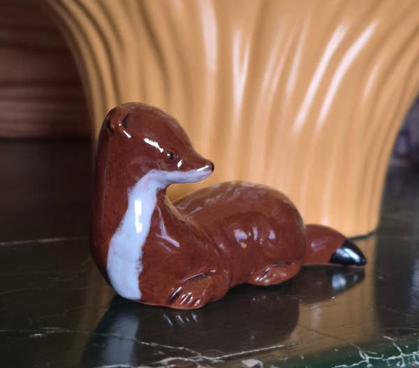 Hermelin som keramikfigur